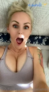 Animelaniefree - Over 20 pics of me laying in bed pulling out my tits