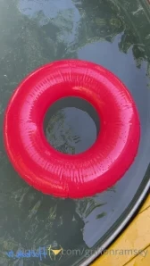 Griffonramsey - cooling off on a hot day and taking a meeting poolside